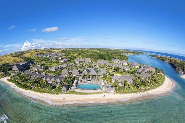 Bird's-eye view of a resort on an island, featuring the resurgence of Fiji's domestic tourism post-Covid-19.