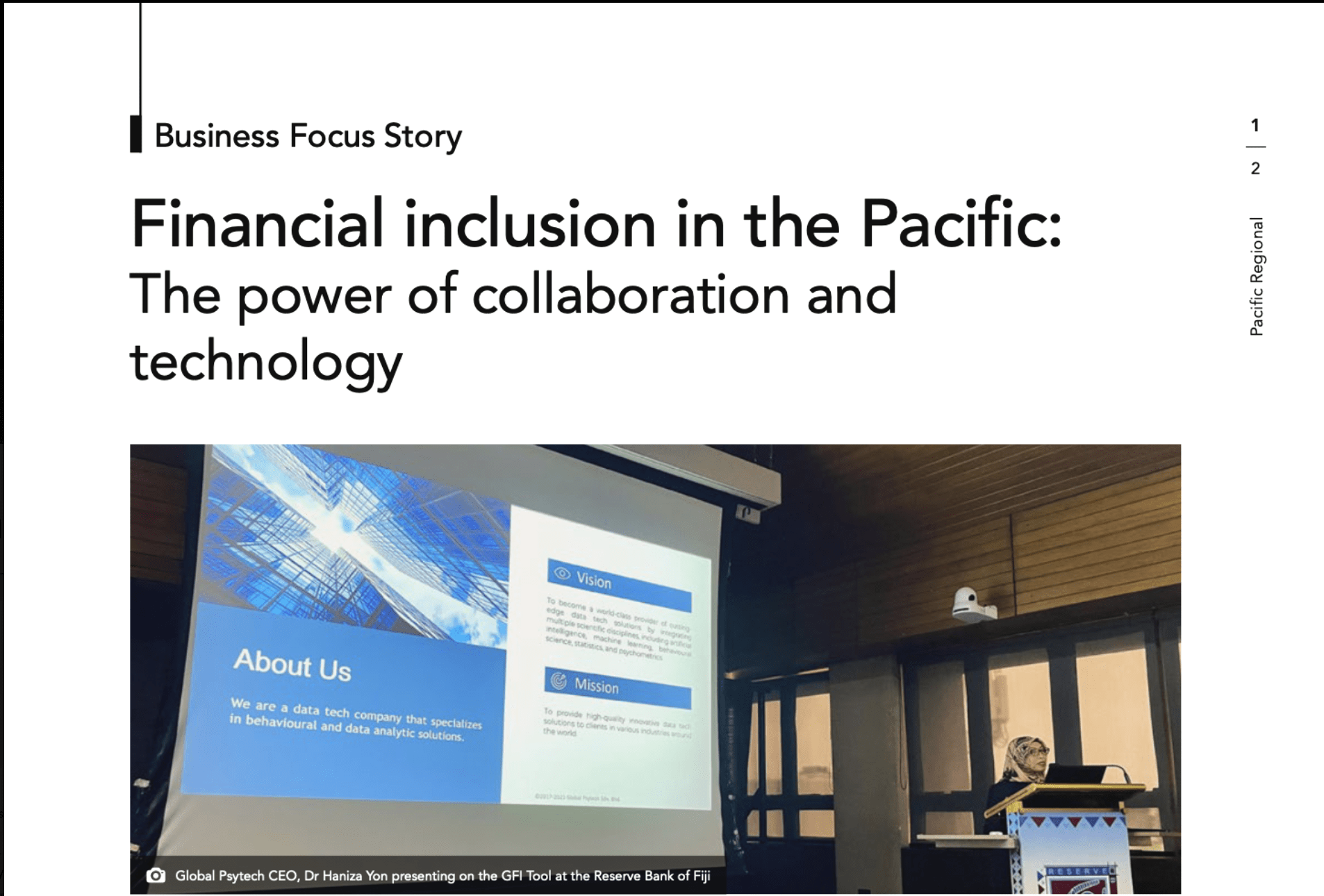 Presenter speaking beside a projected slide about data and analytics at a financial inclusion event.