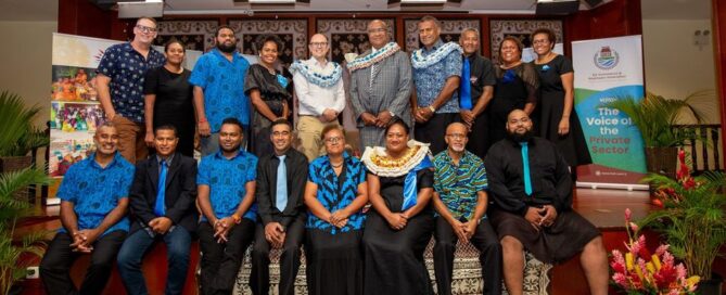 A diverse group celebrating at the Fiji Enterprise Engine 2022 cohort graduation ceremony.