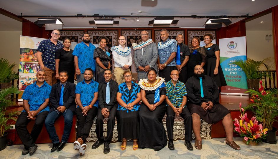 A diverse group celebrating at the Fiji Enterprise Engine 2022 cohort graduation ceremony.
