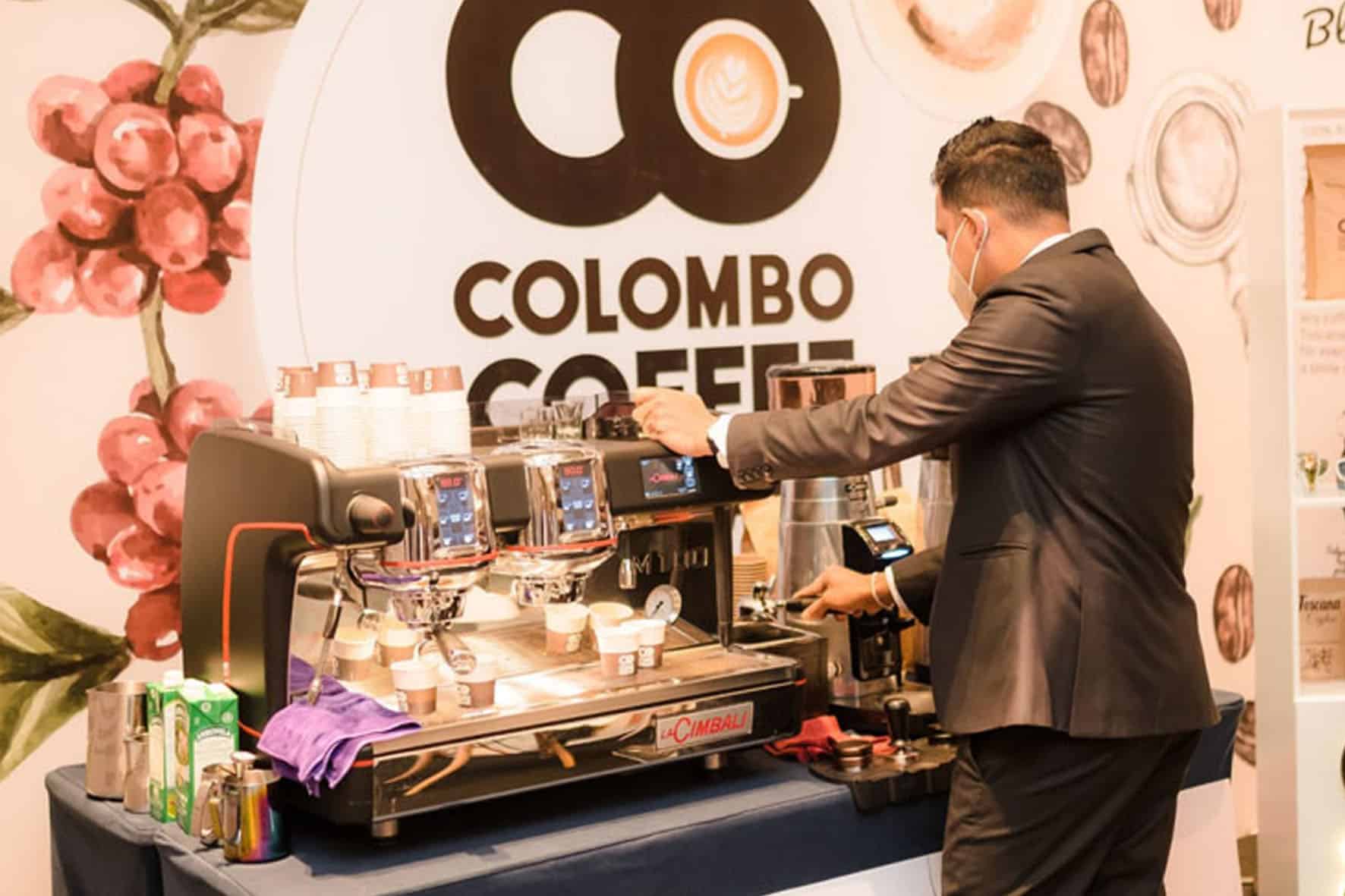 Barista preparing coffee on an espresso machine at the Sri Lanka Coffee Festival.